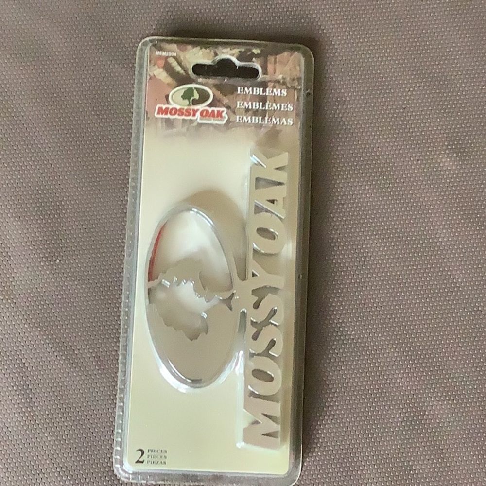 New in box mossy oak emblems